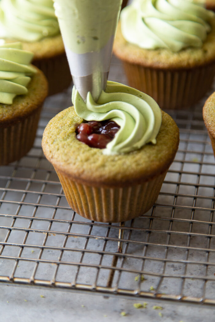 pipe matcha buttercream over sweetened red bean filling.