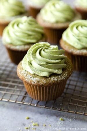 matcha cupcakes filled with sweet red bean and frosted with matcha buttercream.