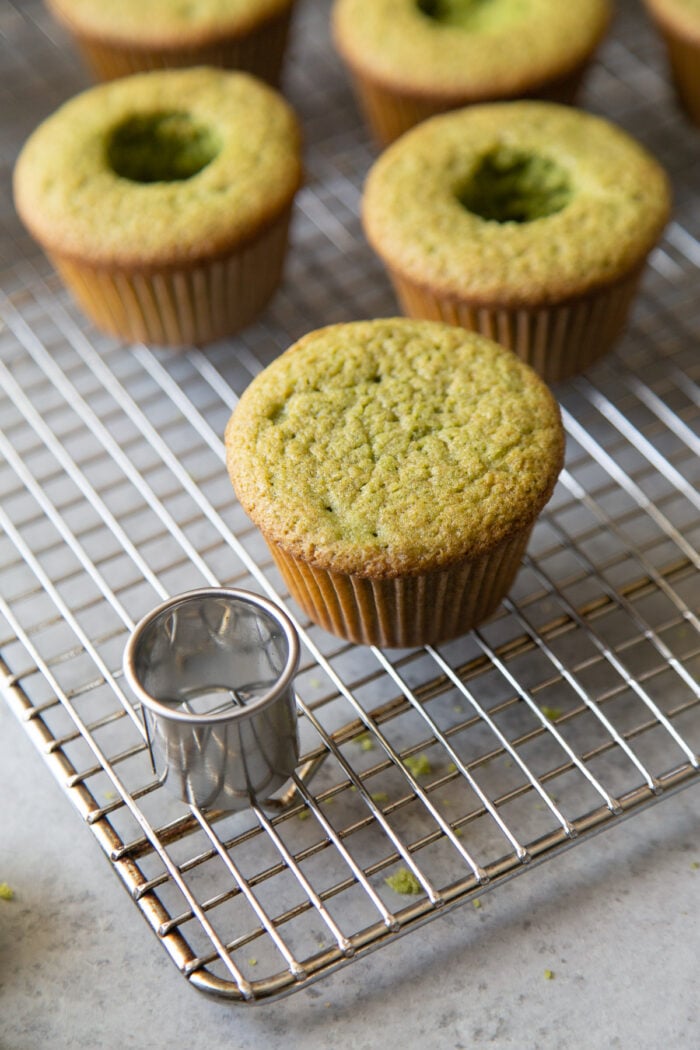 use a small round cookie cutter to punch out cavity in cooled matcha cupcake.