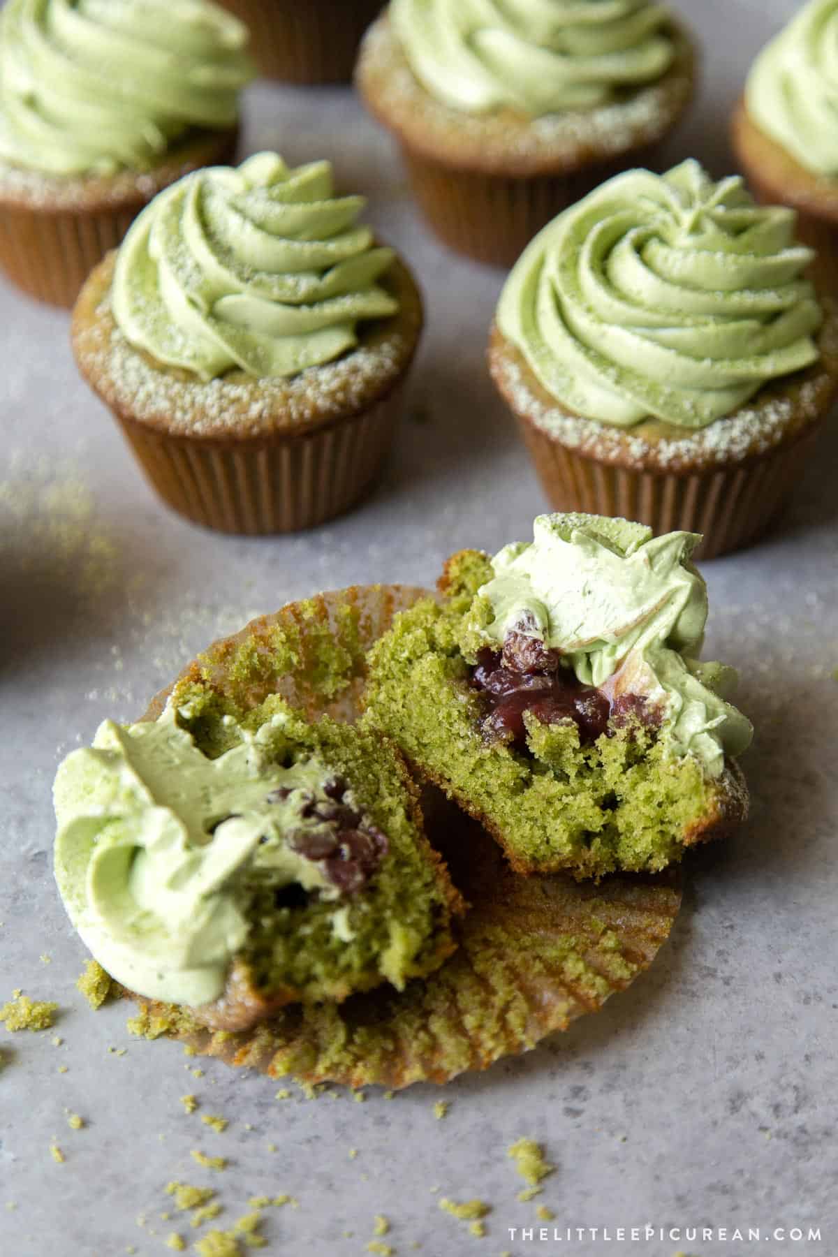 cut matcha cupcake featuring sweet red bean center filling.