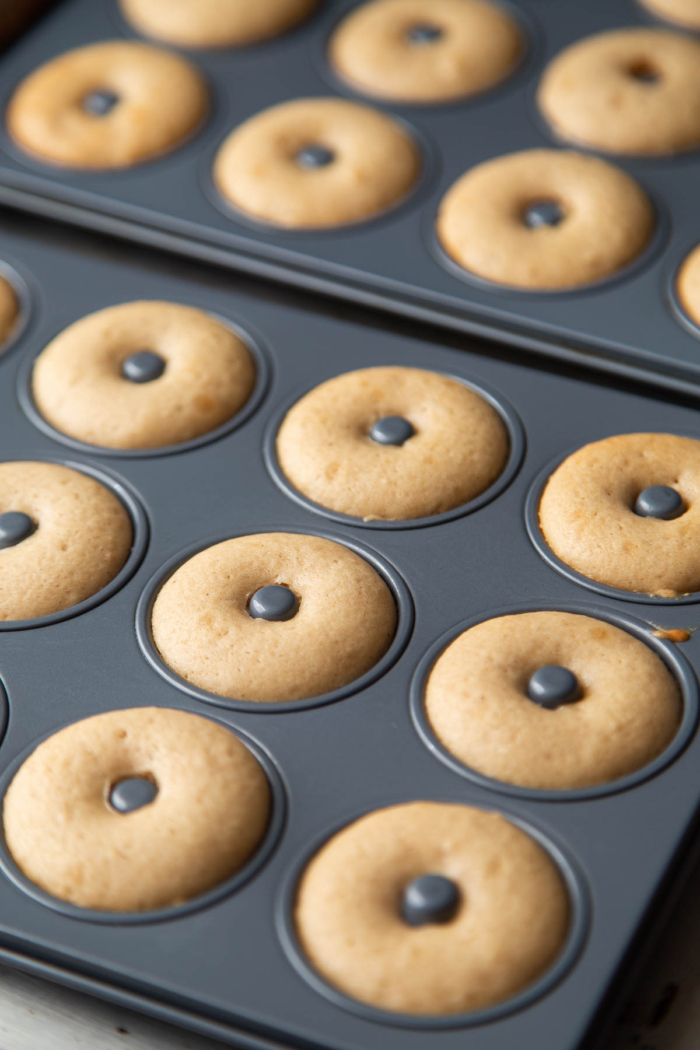 baked mini donuts in pan.