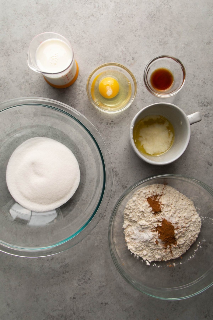 portioned out ingredients needed for baked mini donuts.