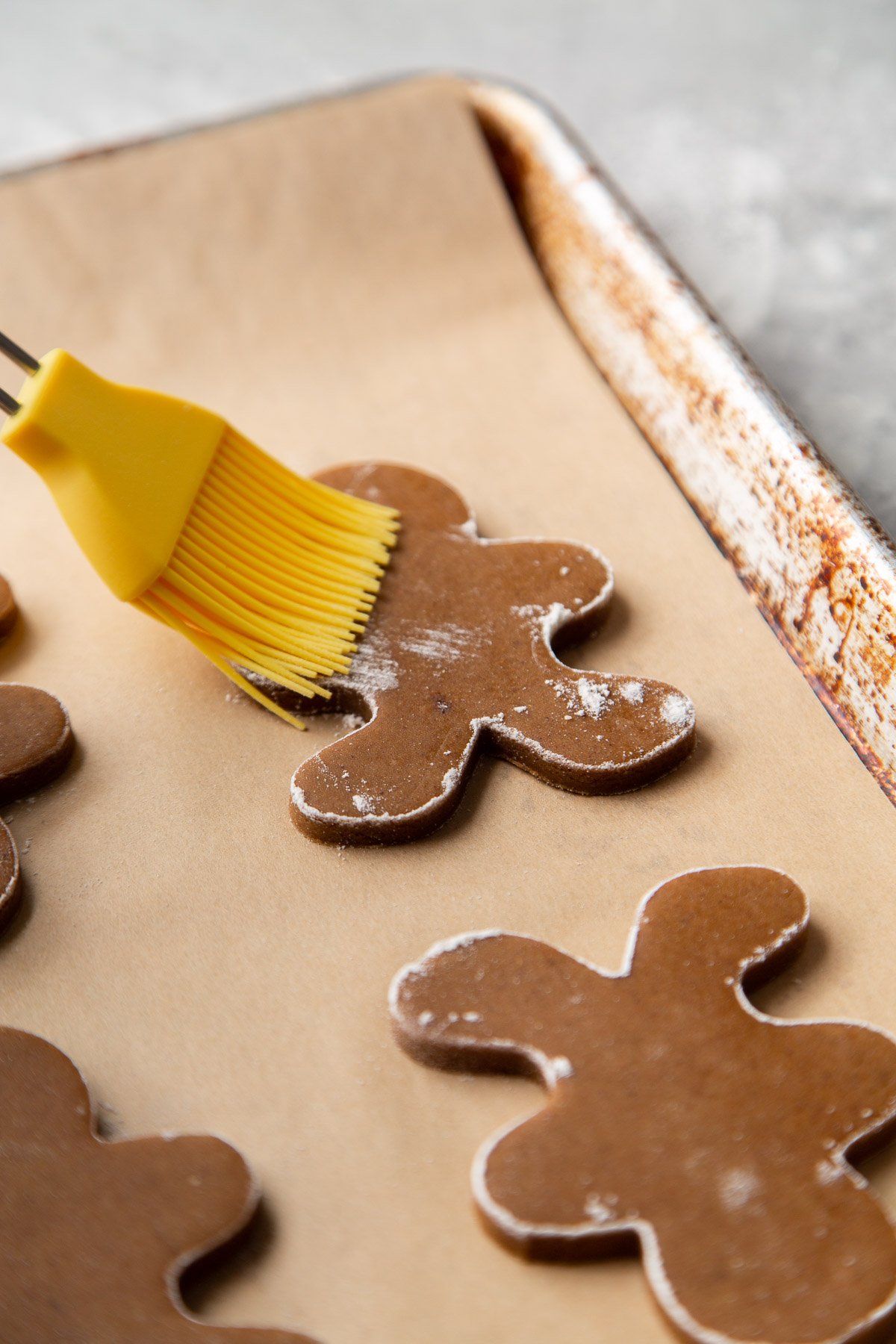 brush off excess flour from cookie dough before baking.