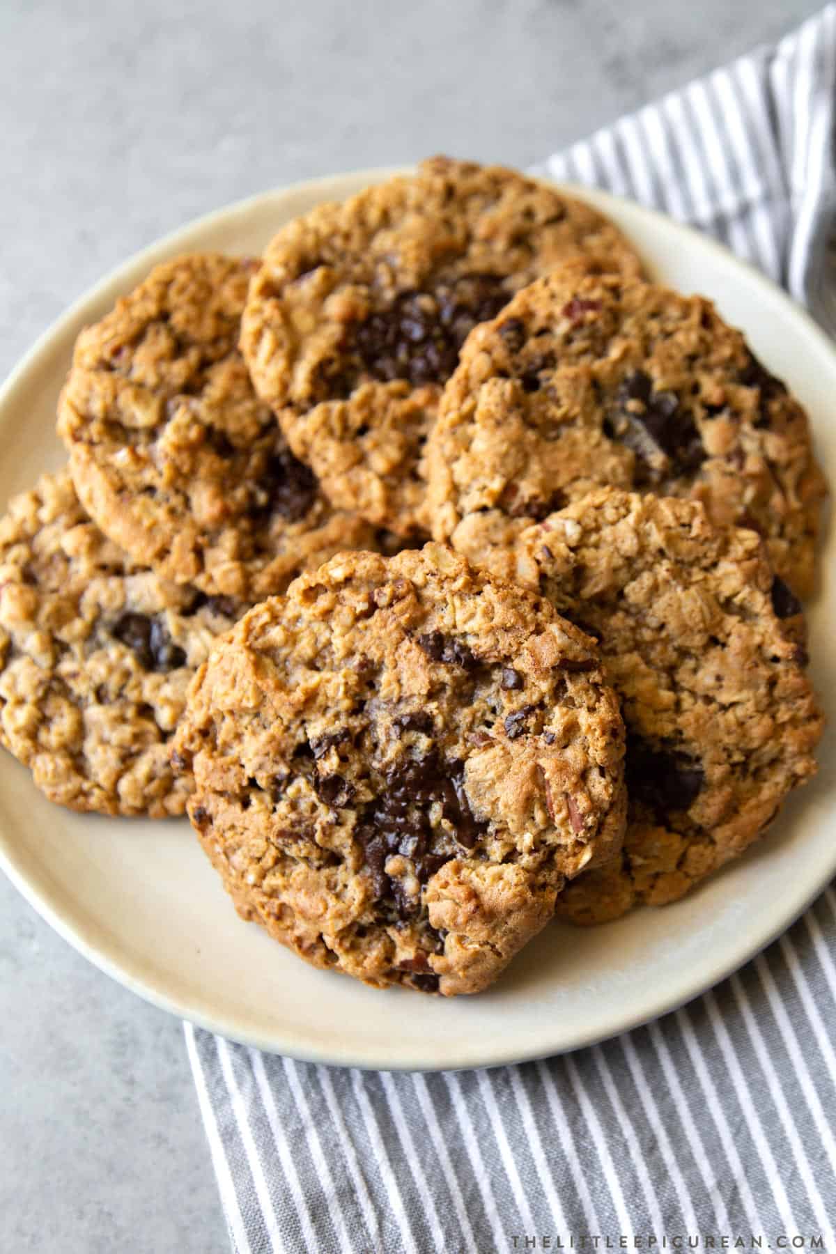 flourless oatmeal chocolate chip cookies arranged in a circle on serving plate. 