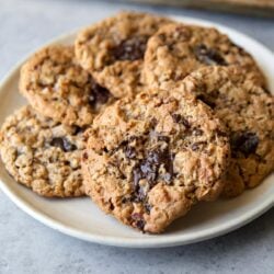 gluten free flourless oatmeal chocolate chip cookies arranged on serving plate.