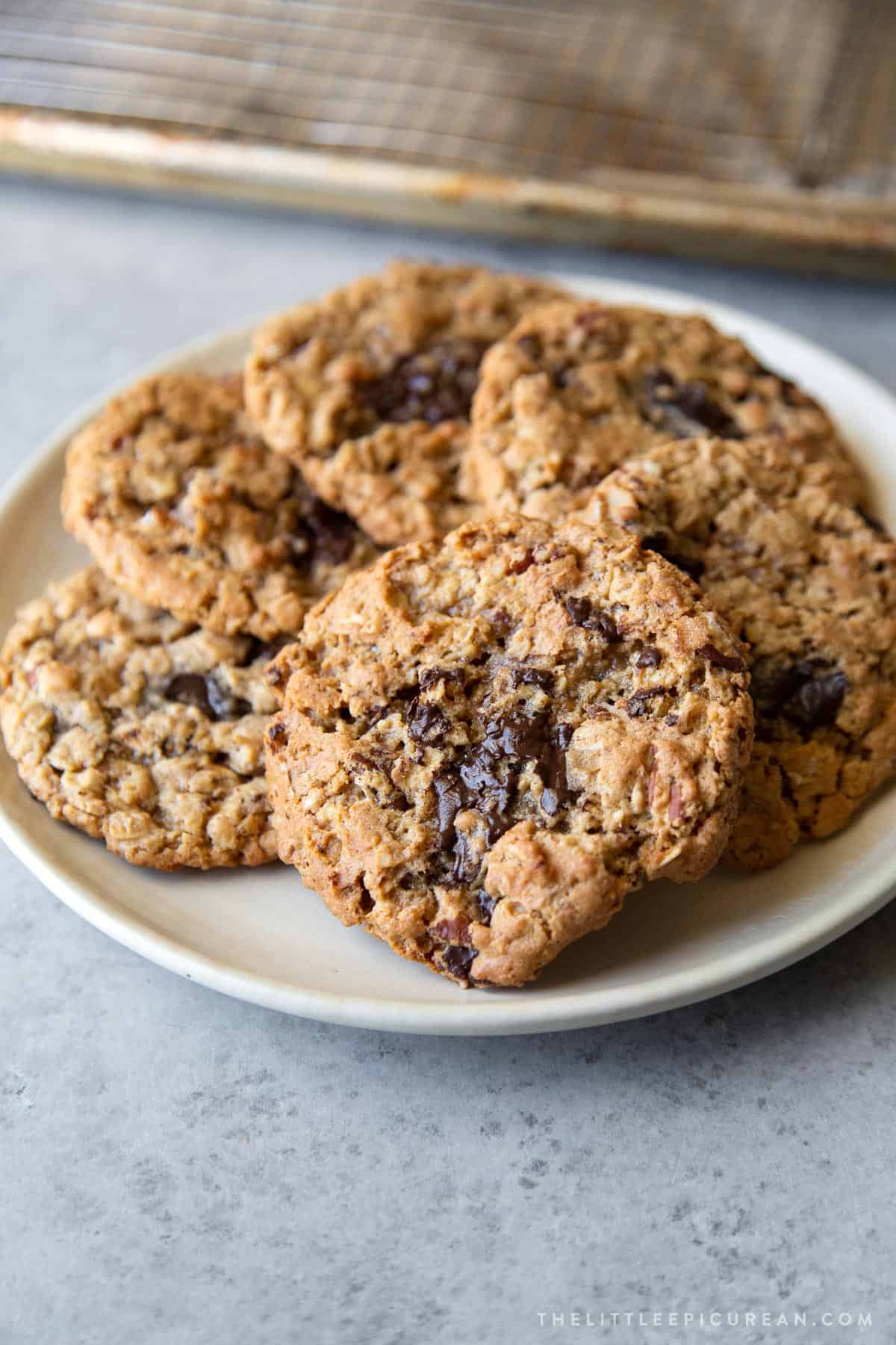 gluten free flourless oatmeal chocolate chip cookies arranged on serving plate.