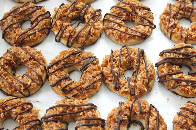 Homemade Samoa Cookies. Shortbread cookies topped with caramel, coconut, and chocolate