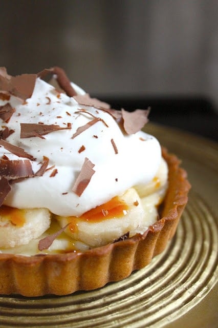 Banana Cream Tart with caramel, chocolate, and whipped cream