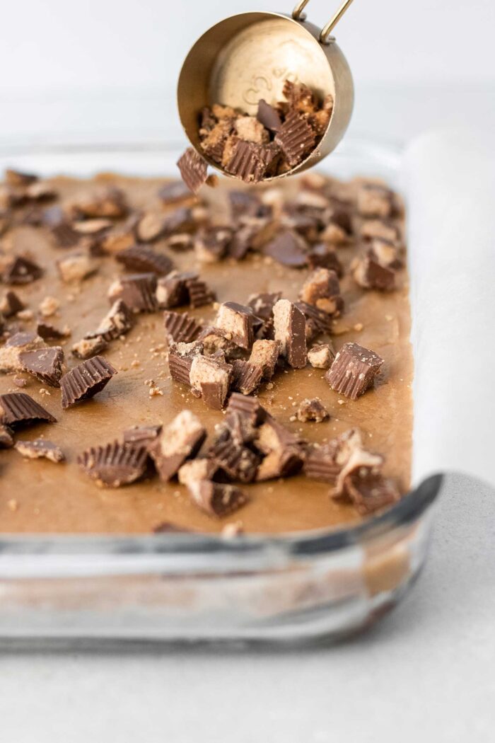 sprinkle chopped peanut butter chocolate candies over batter