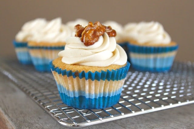 Vanilla cupcakes with maple frosting and candied walnuts