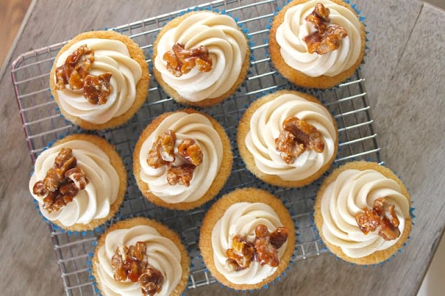 vanilla cupcakes with maple frosting and candied walnuts