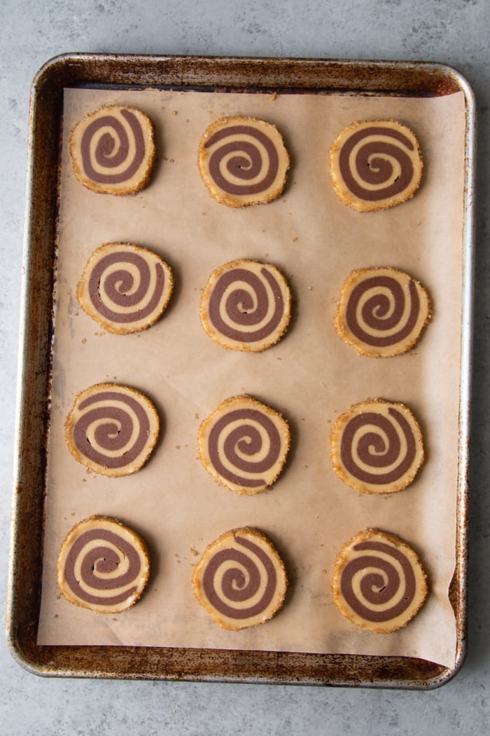 slice and bake cookies arranged on parchment lined baking sheet before baking.