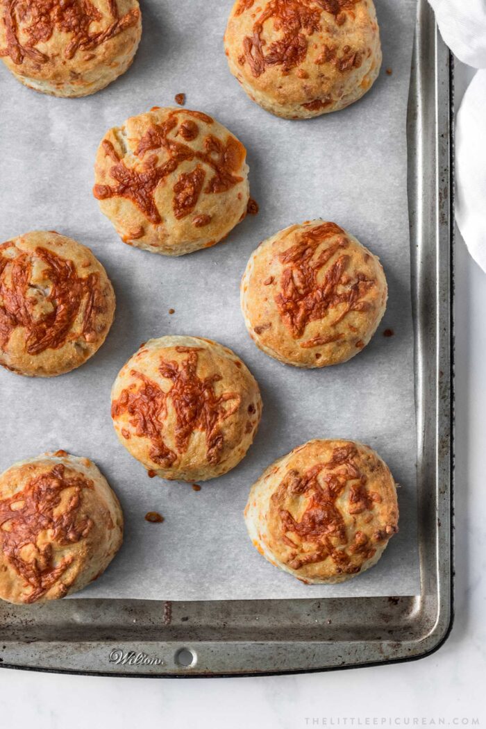 overhead shot of fresh baked cheddar cheese cream biscuits