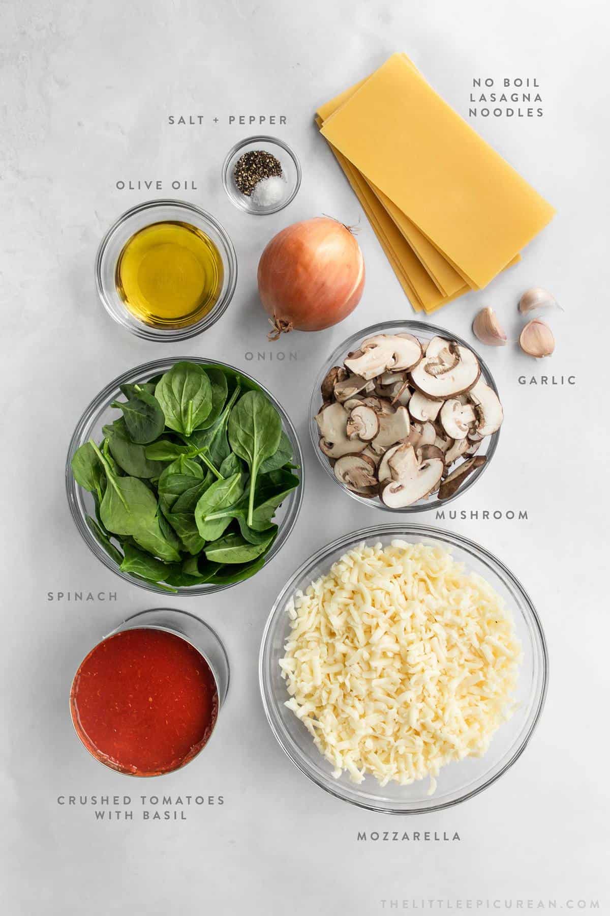 overhead of ingredients needed to make spinach-mushroom lasagna