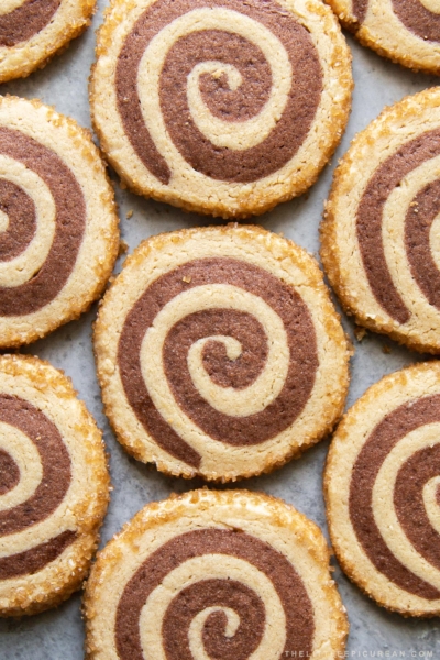 close up of peanut butter chocolate swirl cookies arranged in rows.