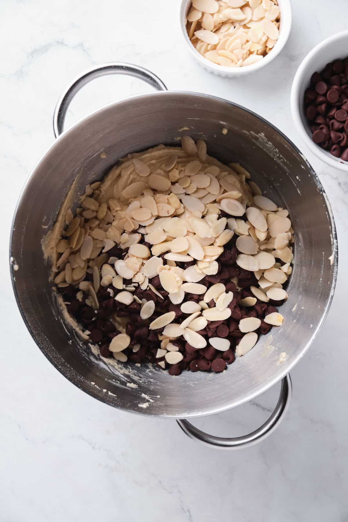 sliced almonds and chocolate chips added to cookie bar dough.