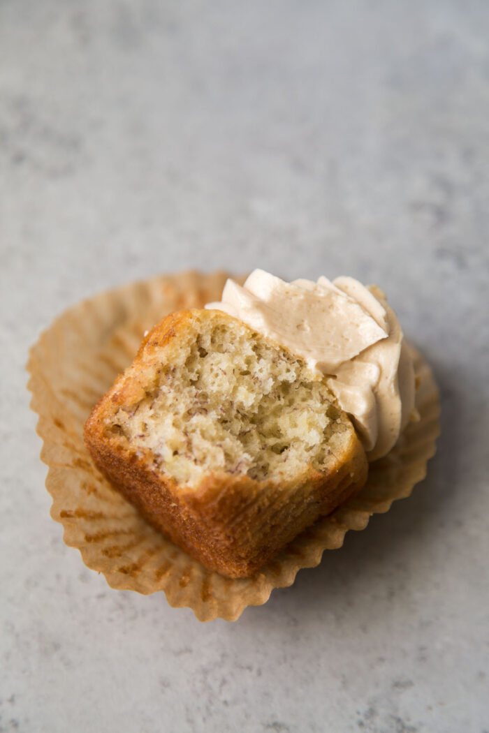 soft fluffy interior of banana cupcake with peanut butter frosting.