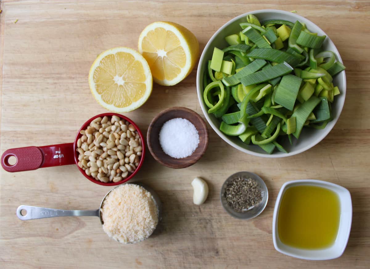 leek pesto ingredients include leek greens, pine nuts, garlic, lemon, and parmesan cheese. 