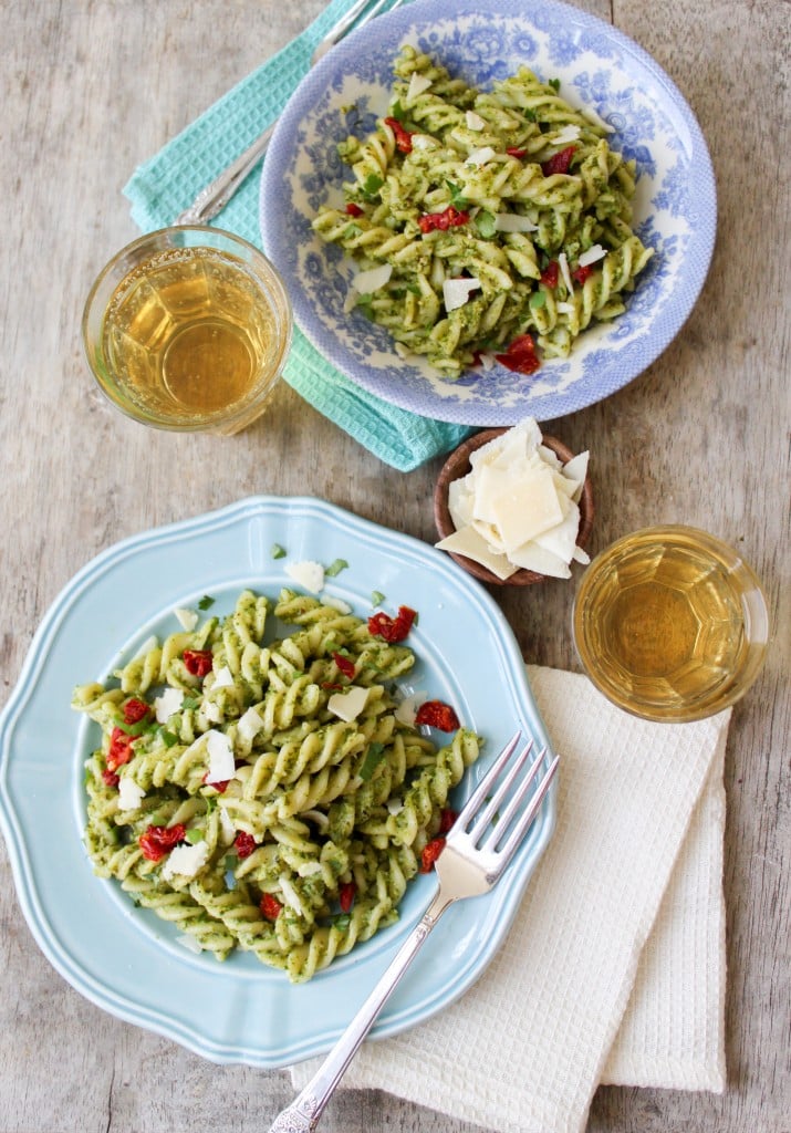 Fusilli with arugula pesto, sun-dried tomatoes, and shaved pecorino romano