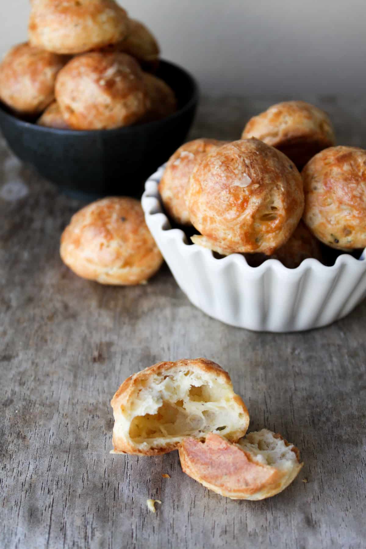 Gougeres have a crisp exterior crust and a soft hallow interior. 