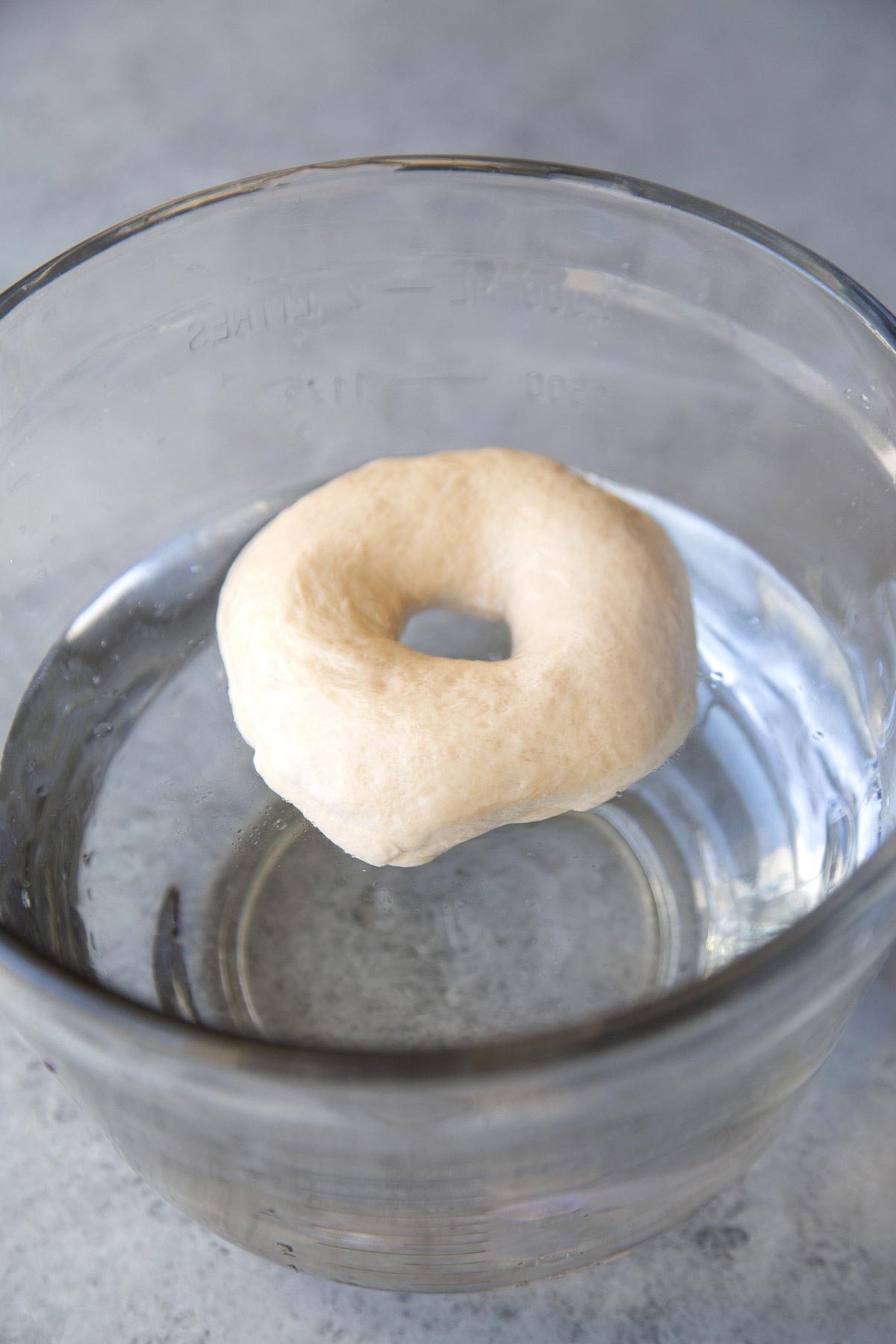 place bagel in bowl of cool water to see if it floats.