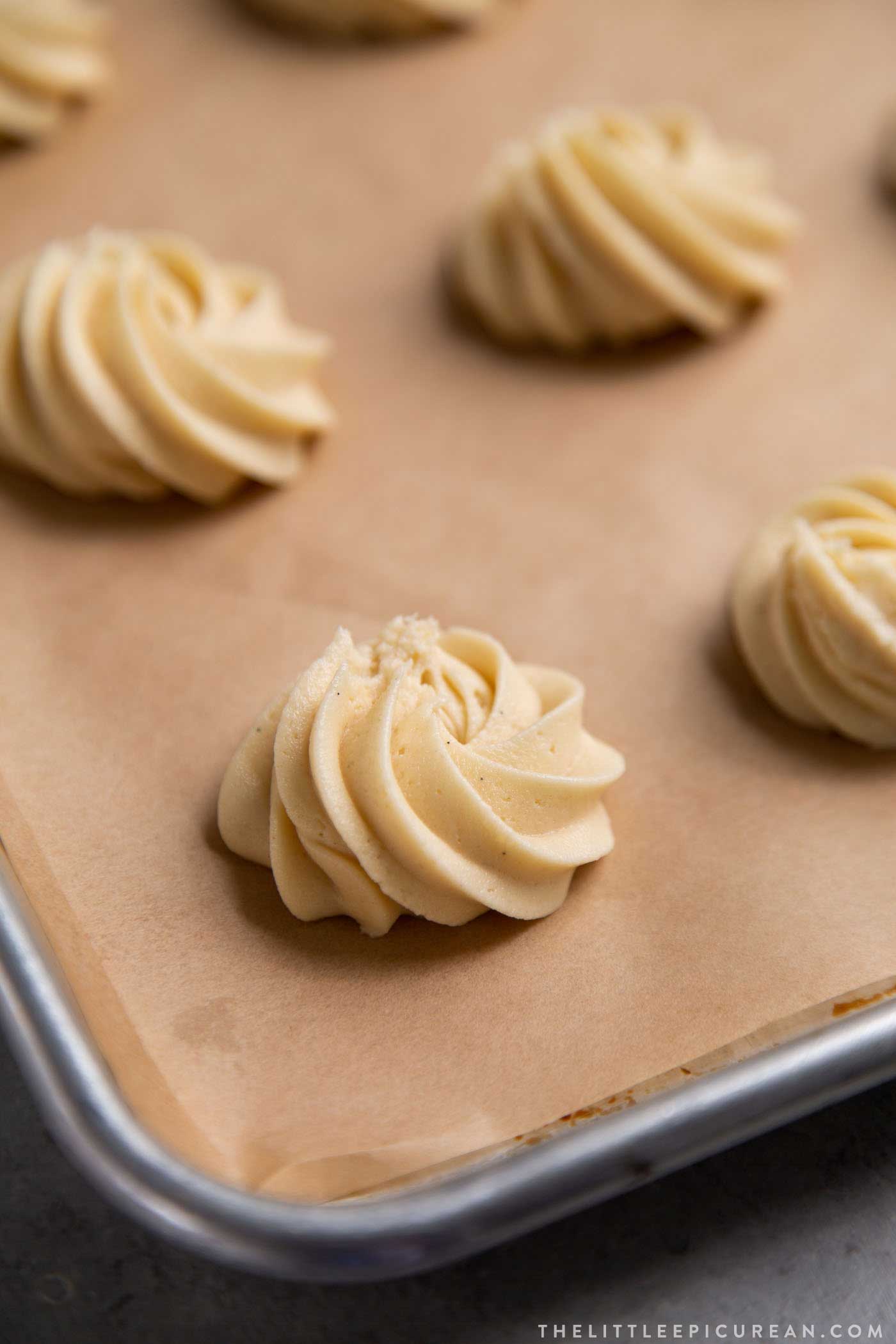 Piped vanilla malt cookie dough before baking