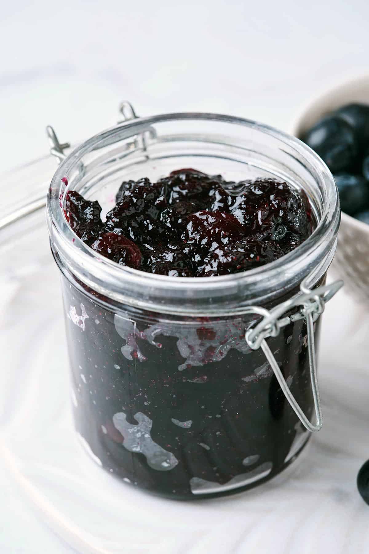 refrigerator blueberry jam in glass container.