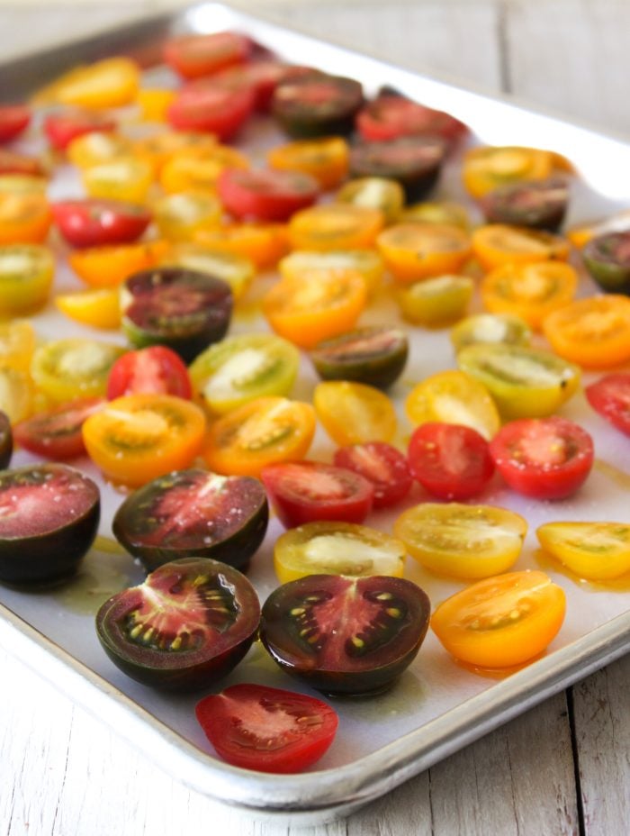 mini heirloom tomatoes in baking sheet