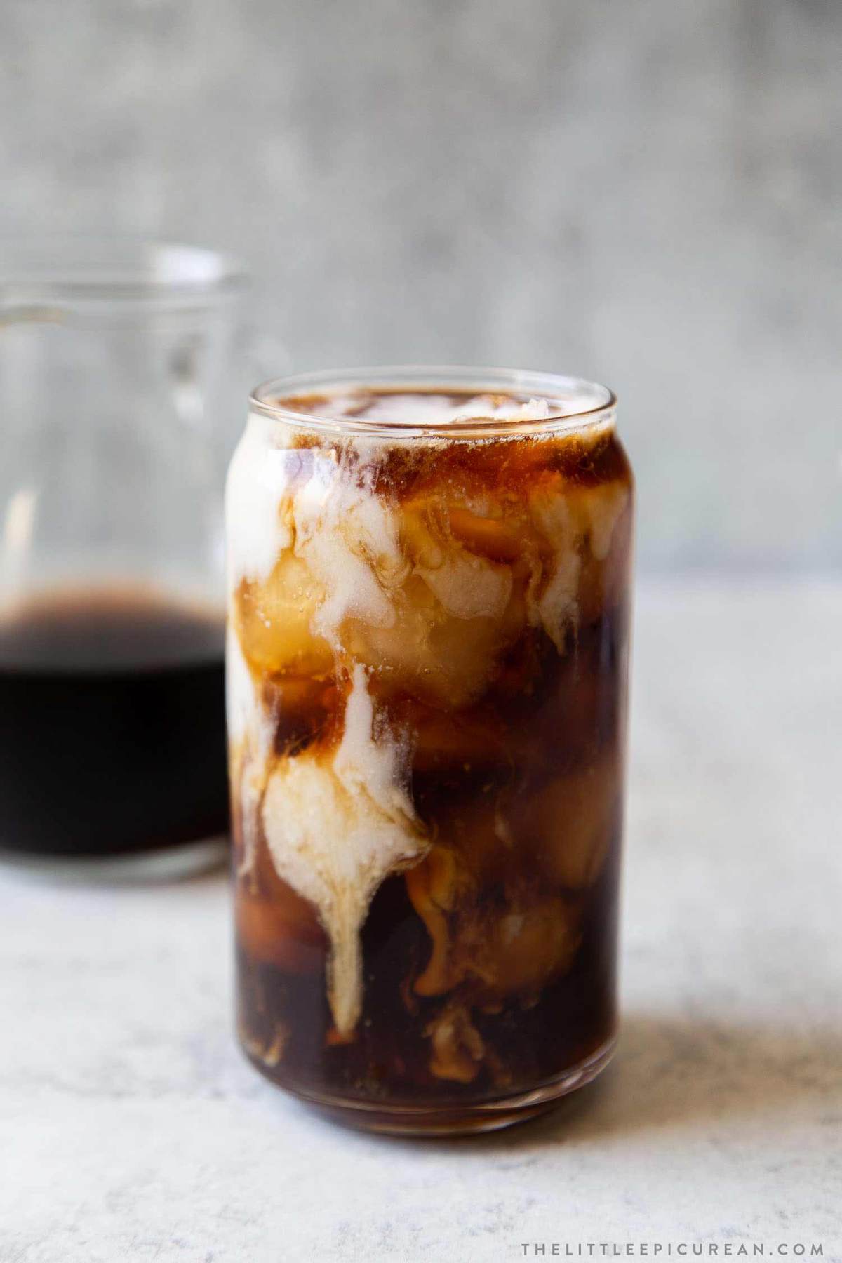 cold brew coffee swirled with milk.