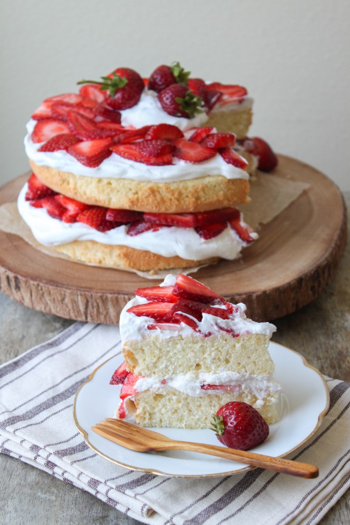 a slice of strawberry layer cake