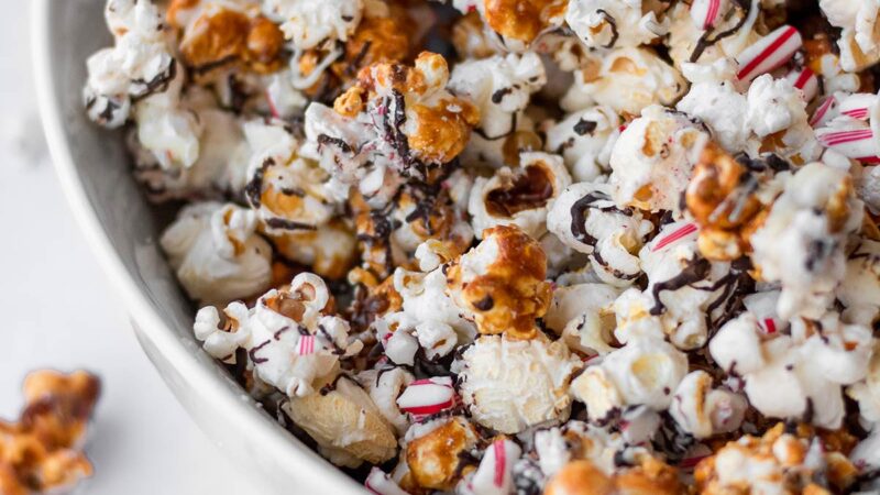 Peppermint bark popcorn in white bowl