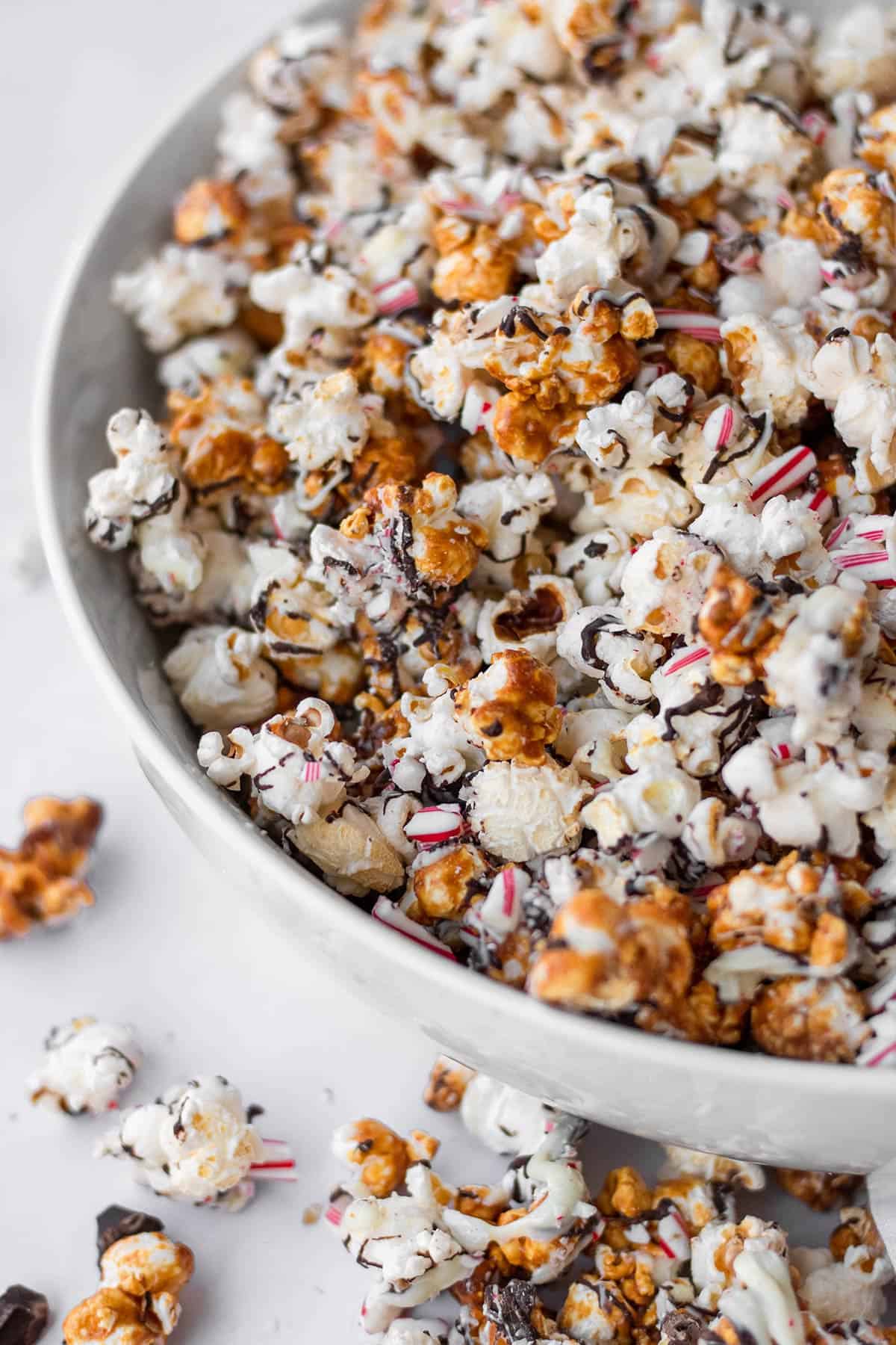 Peppermint bark popcorn in white bowl