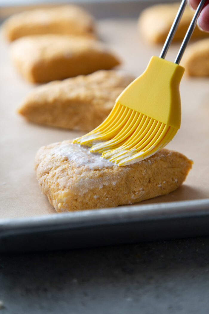 brush scone wedges with heavy cream before baking.