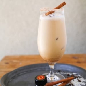 coconut coffee cocktail with cinnamon stick