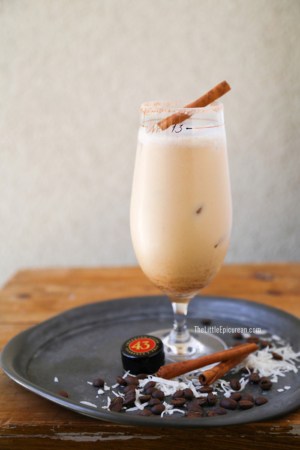 coconut coffee cocktail with cinnamon stick