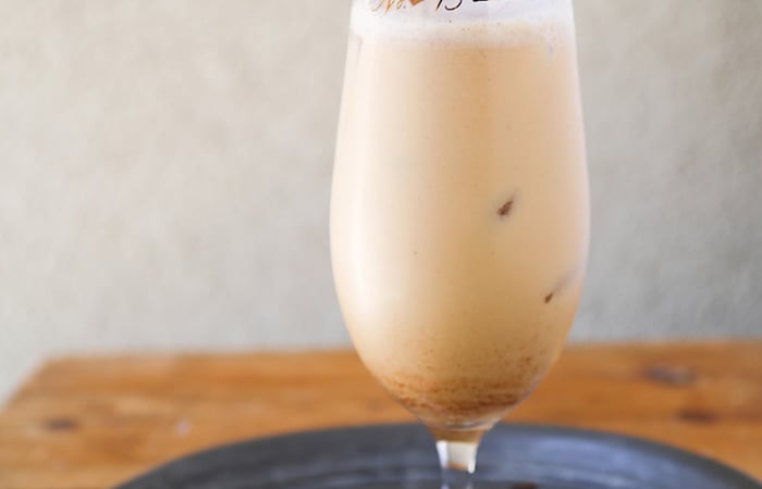 coconut coffee cocktail with cinnamon stick