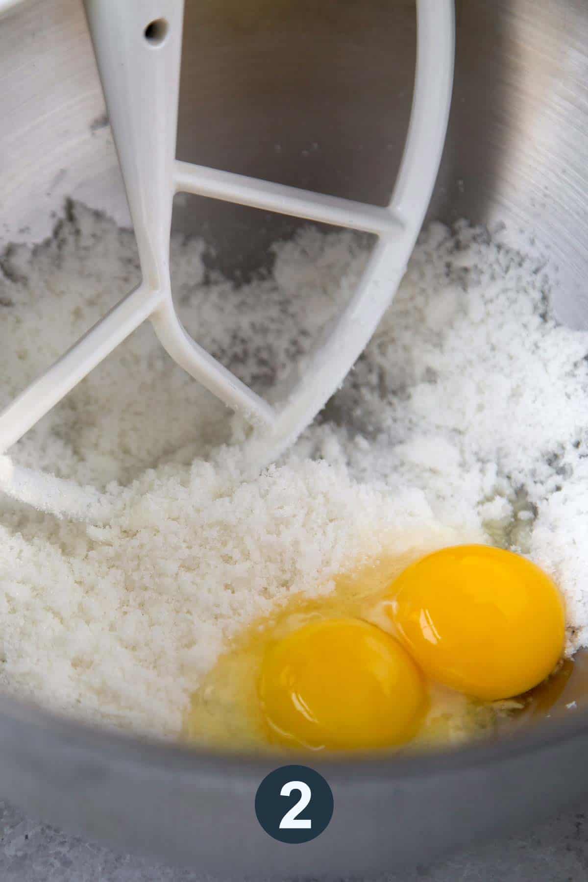 creamed shortening and sugar with two eggs in mixing bowl.
