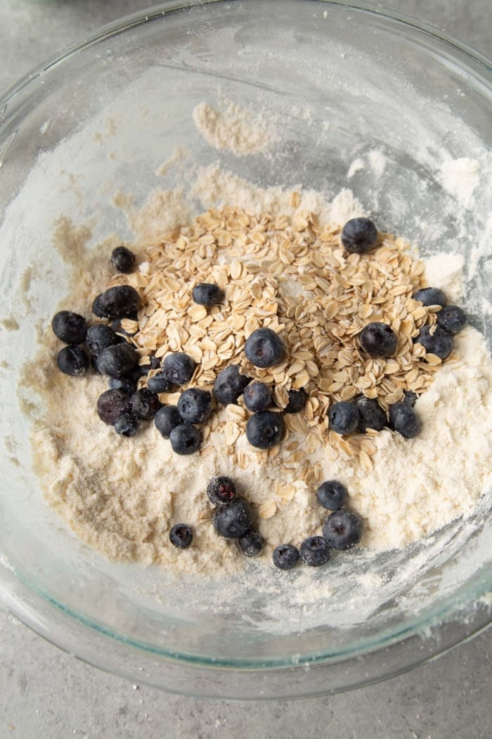 add rolled oats and blueberries to dry mixture.