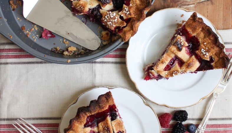 two slices of triple berry pie.