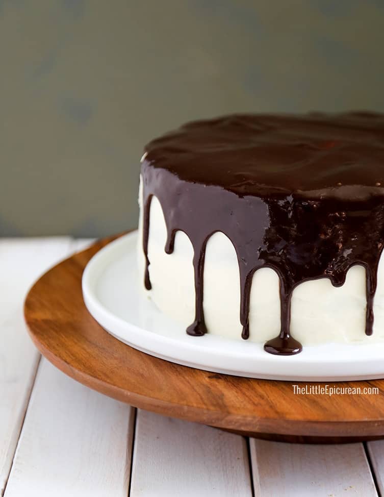 stout chocolate cake frosted with whiskey cream cheese frosting and topped with rich chocolate glaze.
