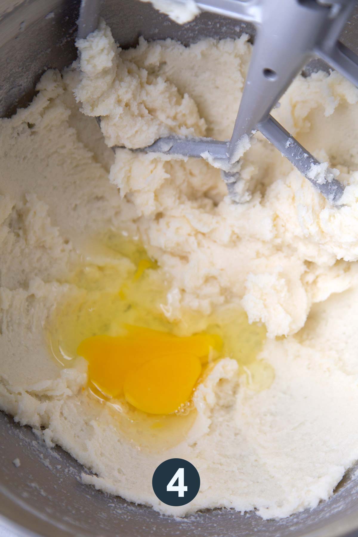 add eggs to cake batter and mix until well incorporated.