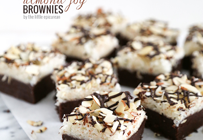 almond joy brownies arranged on parchment paper.