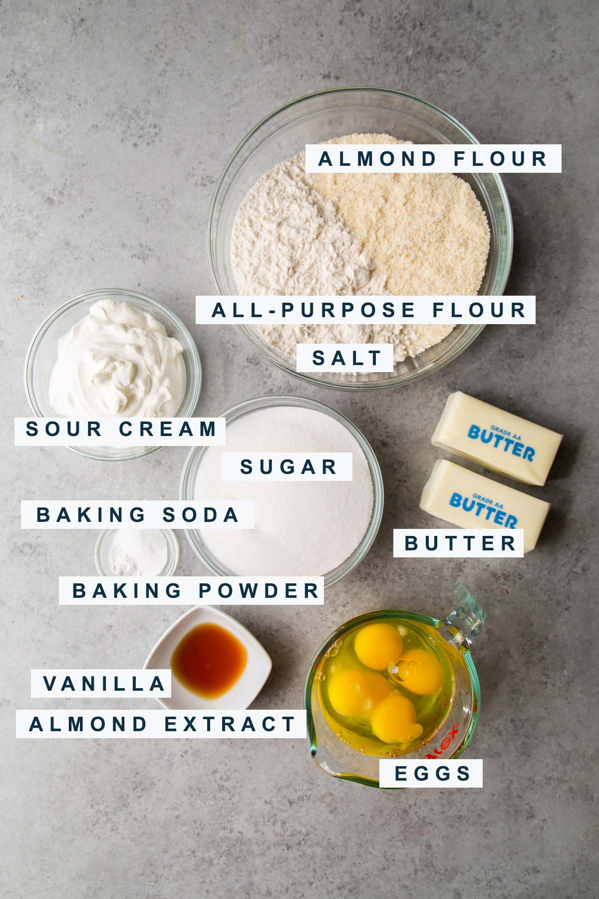 ingredients for almond pound cake include almond flour, eggs, butter, and sour cream.