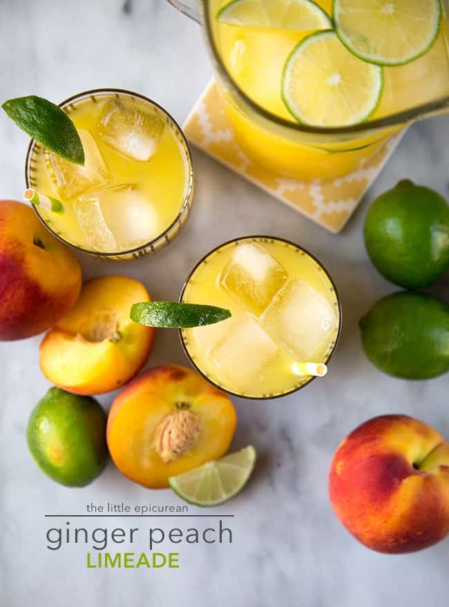 ginger peach limeade garnished with lime wedge. 