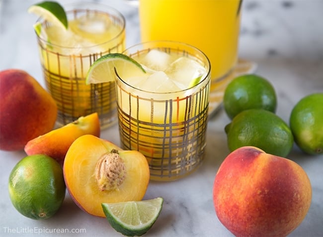 ginger peach limeade garnished with lime wedge.