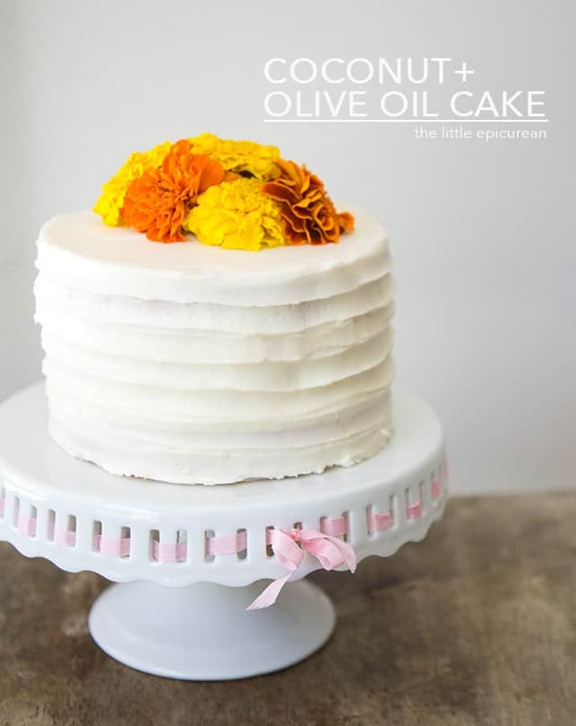 Coconut + Olive Oil Cake with coconut cream cheese frosting and edible flowers