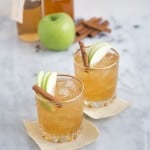 Apple Pie Moonshine Cocktail garnished with cinnamon stick.