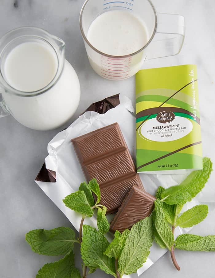 milk, cream, fresh mint, and chocolate candy bar.