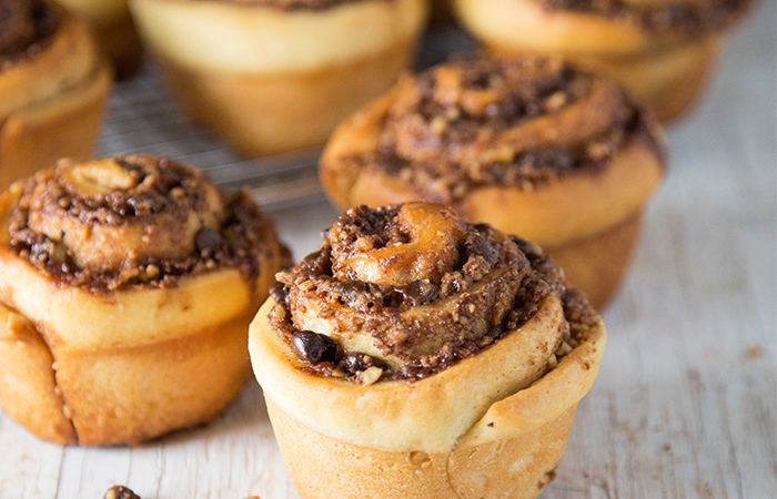 chocolate walnut cinnamon rolls baked in muffin tin.