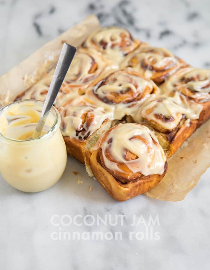 coconut jam cinnamon rolls on marble table.